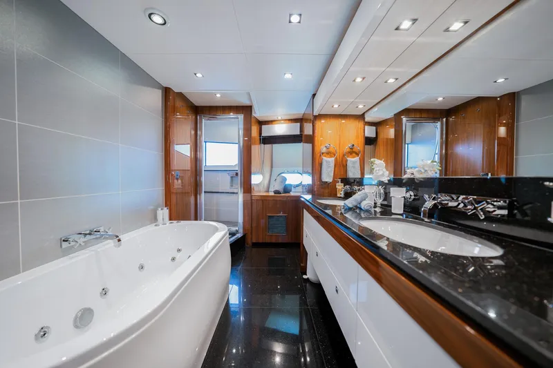 2015 Sunseeker 115' Sport Yacht Yacht Photos Pics Luxurious bathroom in 2015 Sunseeker 115 Sport Yacht with jacuzzi and elegant fixtures.