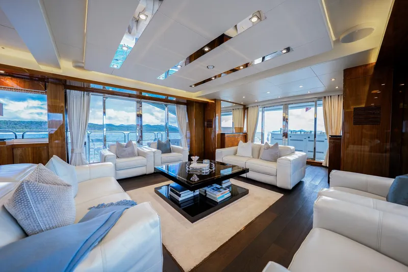 2015 Sunseeker 115' Sport Yacht Yacht Photos Pics Luxurious interior of 2015 Sunseeker 115 Sport Yacht with elegant white seating and panoramic windows.