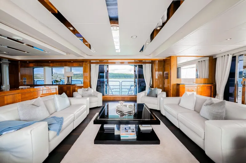 2015 Sunseeker 115' Sport Yacht Yacht Photos Pics Luxurious interior of 2015 Sunseeker 115 Sport Yacht with elegant white sofas and panoramic windows.