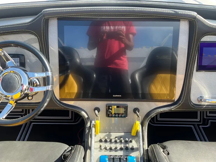  Yacht Photos Pics MTI 52RP 2018 dashboard with Garmin display and modern controls.