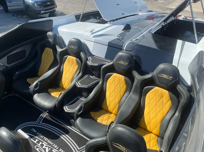  Yacht Photos Pics Luxury MTI 52RP boat interior with yellow and black seats, 2018 model.