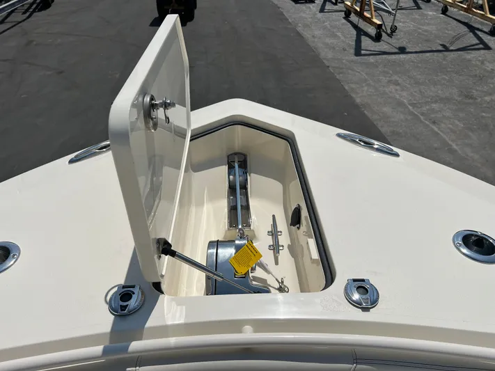  Yacht Photos Pics 2025 Scout 357 LXF boat anchor compartment open on deck.
