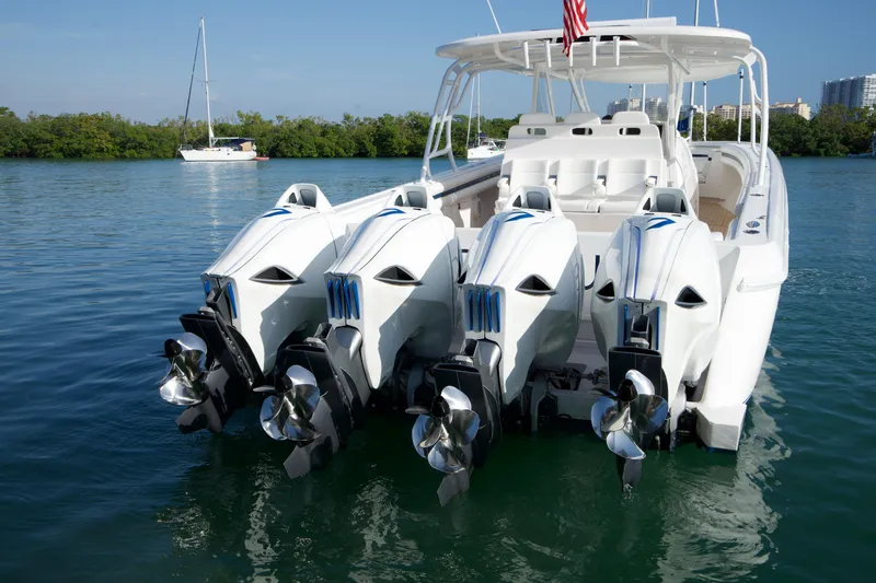Audacious Yacht Photos Pics 2016 Intrepid 475 Panacea boat with quad outboard engines on water.
