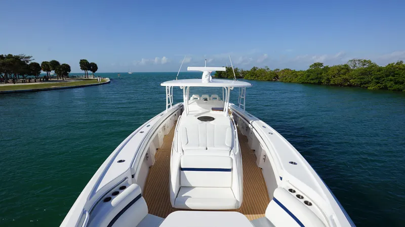 Audacious Yacht Photos Pics 2016 Intrepid 475 Panacea boat cruising in a scenic waterway.