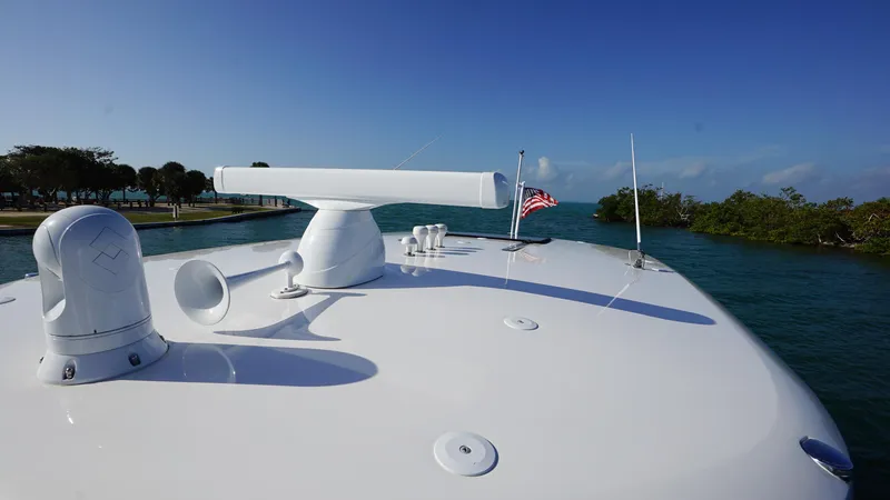 Audacious Yacht Photos Pics 2016 Intrepid 475 Panacea yacht bow with radar and American flag.