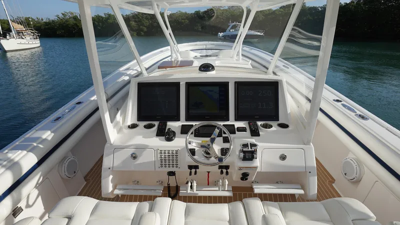 Audacious Yacht Photos Pics 2016 Intrepid 475 Panacea boat cockpit with advanced navigation systems.