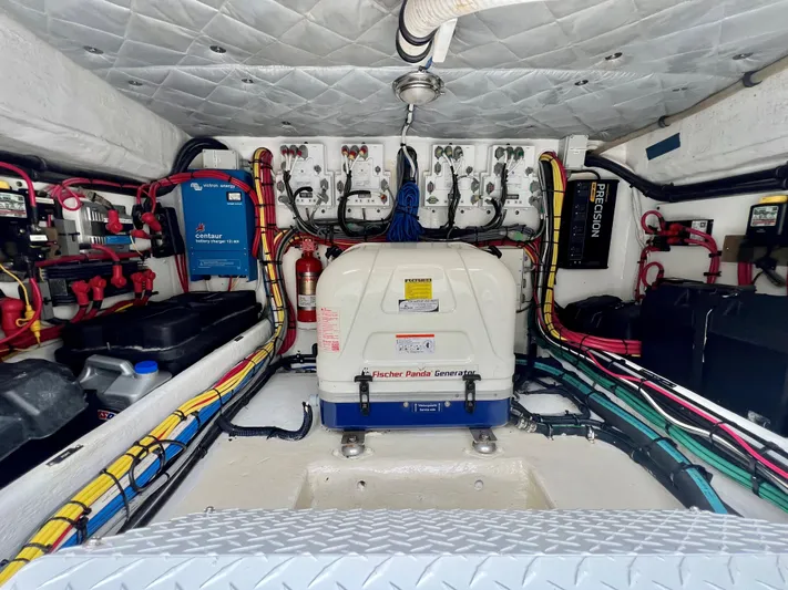 Audacious Yacht Photos Pics Engine room of a 2016 Intrepid 475 Panacea with Fischer Panda generator.