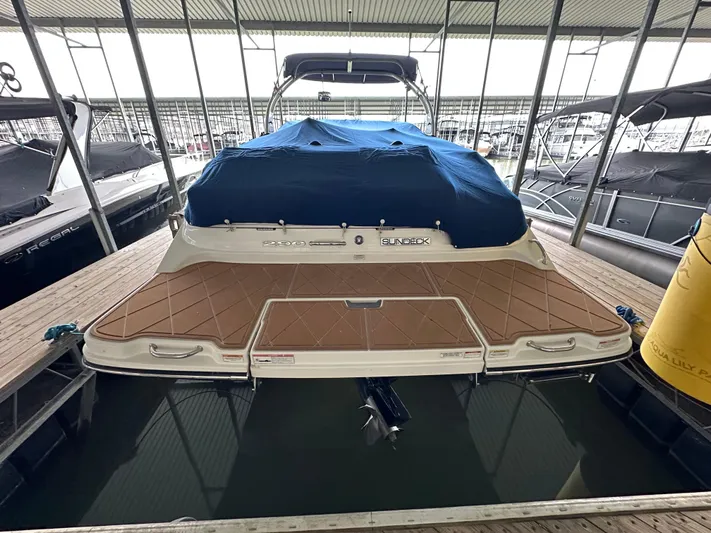  Yacht Photos Pics 2016 Sea Ray SDX 290 boat docked with blue cover, rear view.