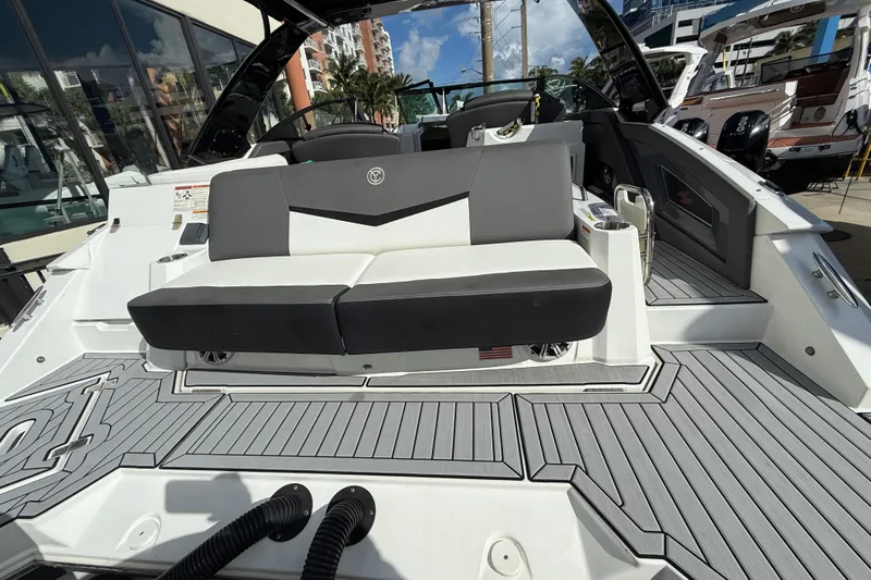  Yacht Photos Pics 2019 Cruisers Yachts 338 Outboard with sleek seating and modern deck design.