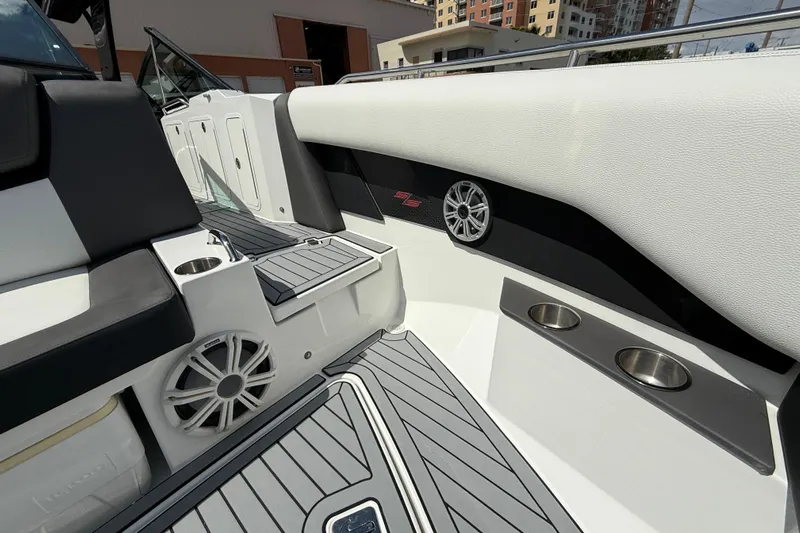  Yacht Photos Pics 2019 Cruisers Yachts 338 Outboard interior with speakers and cup holders.