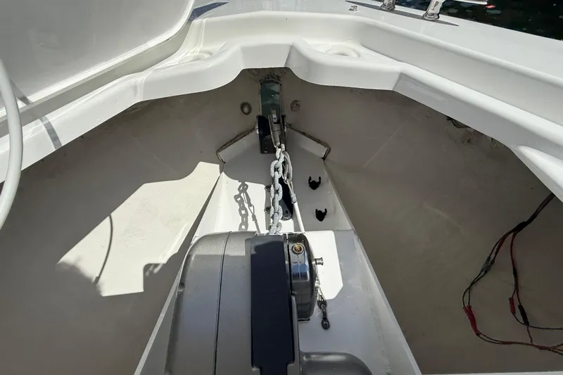  Yacht Photos Pics 2019 Cruisers Yachts 338 Outboard anchor compartment with chain and winch.