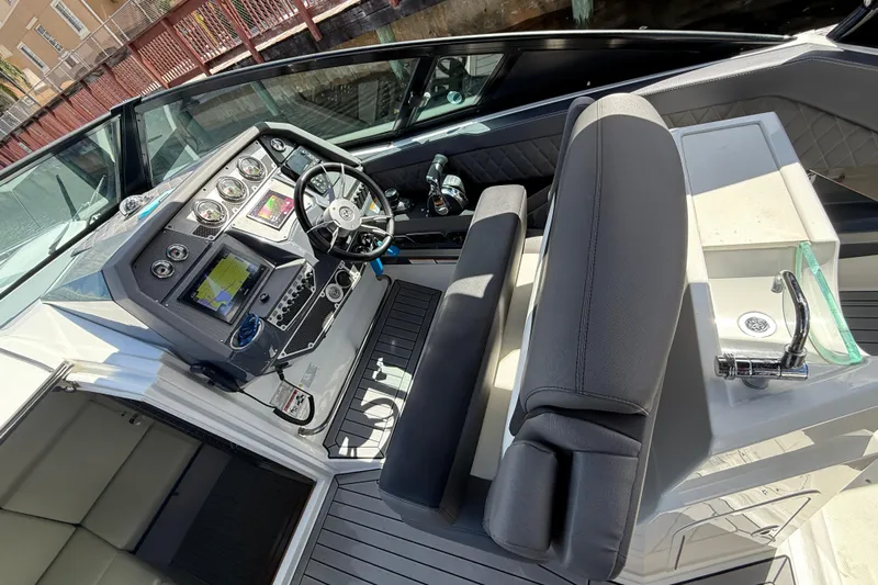  Yacht Photos Pics 2019 Cruisers Yachts 338 Outboard cockpit with modern controls and seating.