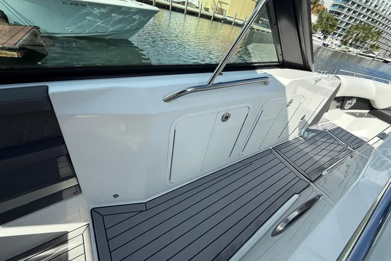  Yacht Photos Pics 2019 Cruisers Yachts 338 Outboard interior with sleek deck and modern design.