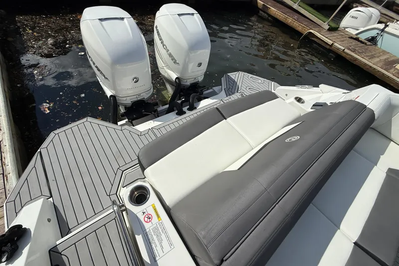  Yacht Photos Pics 2019 Cruisers Yachts 338 Outboard with dual engines and sleek seating on deck.