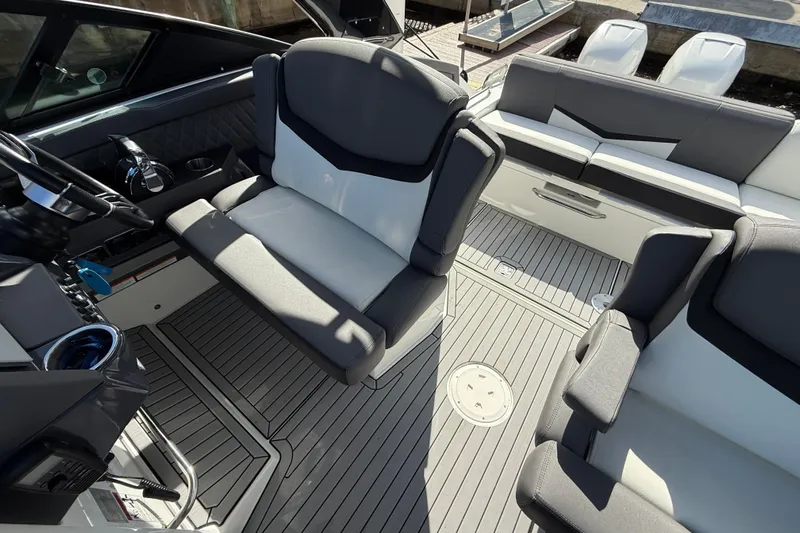  Yacht Photos Pics 2019 Cruisers Yachts 338 Outboard interior with modern seating and sleek design.