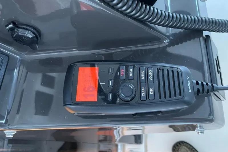  Yacht Photos Pics Garmin marine radio on 2023 Pursuit S 358 Sport boat dashboard.