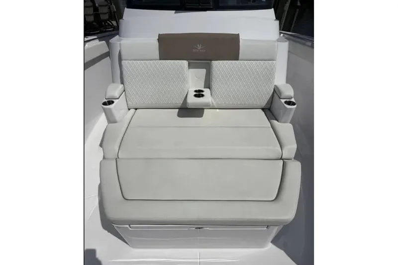  Yacht Photos Pics 2024 Bertram 39 CC boat seating with cup holders and cushioned backrest.