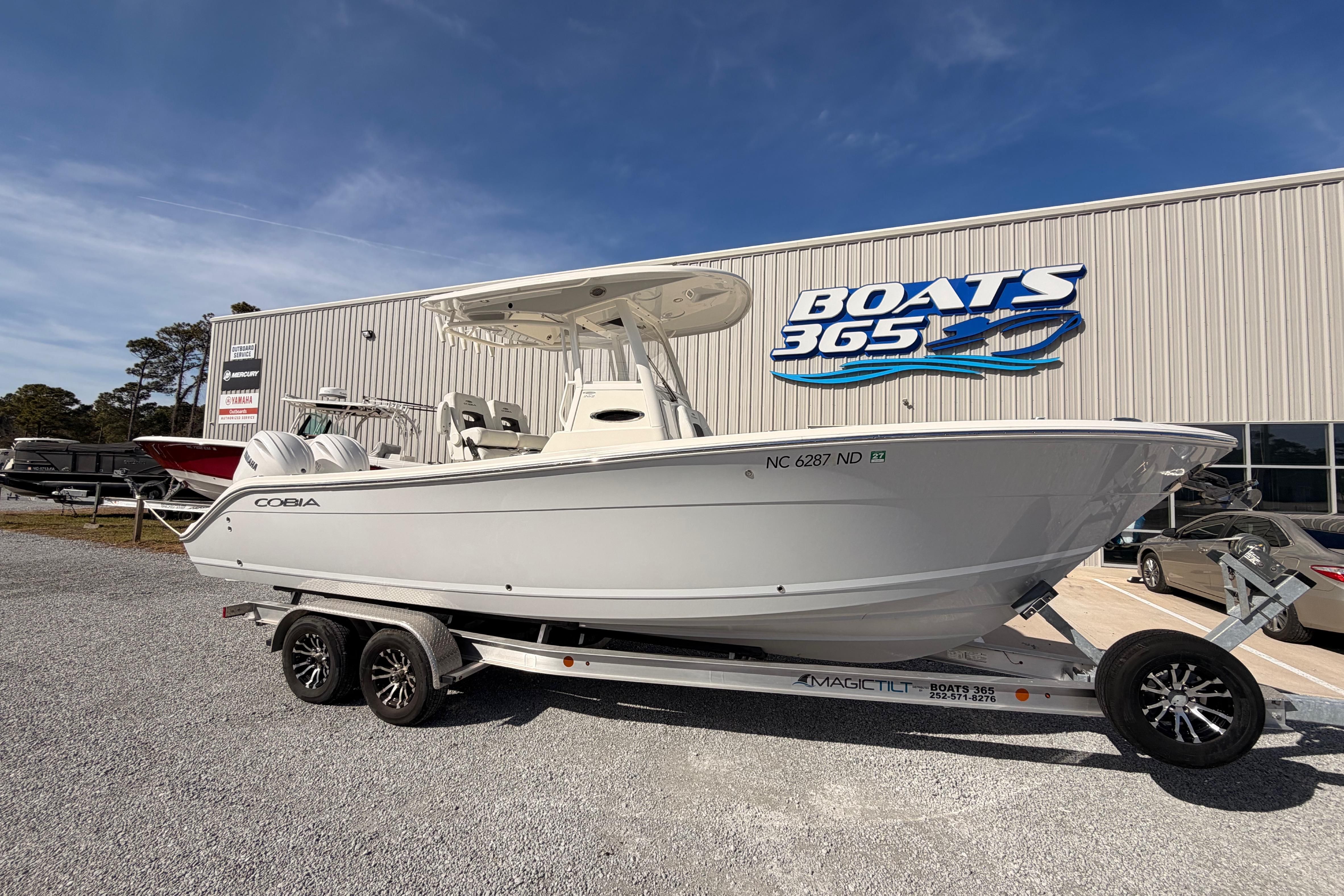 2024 Cobia 262 Center Console boat on trailer at Boats 365 dealership.