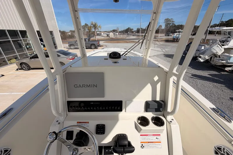  Yacht Photos Pics 2024 Cobia 262 Center Console boat dashboard with Garmin navigation system.