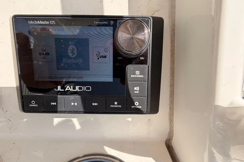  Yacht Photos Pics JL Audio MediaMaster 105 on 2024 Cobia 262 Center Console boat, featuring Bluetooth and USB options.