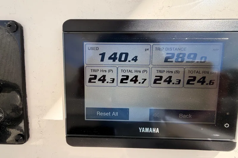  Yacht Photos Pics Display screen showing fuel usage and trip data for 2024 Cobia 262 Center Console.