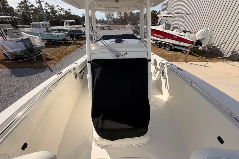  Yacht Photos Pics 2024 Cobia 262 Center Console boat, interior view, parked in a marina.