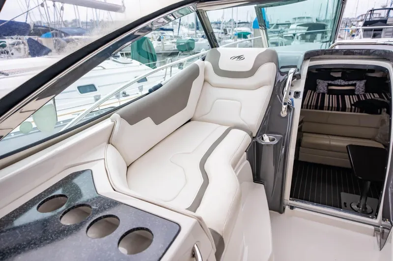 Memory Maker Yacht Photos Pics Interior of a 2013 Monterey 340 Sport Yacht with luxurious seating and modern design.