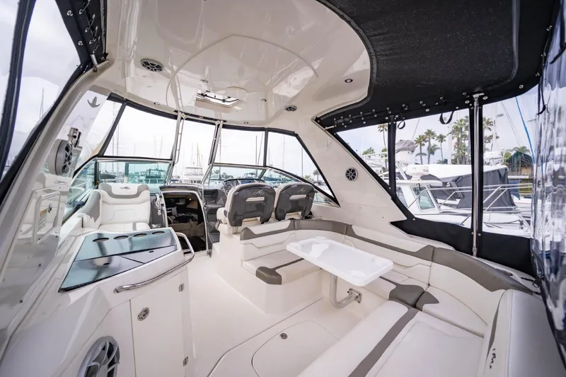 Memory Maker Yacht Photos Pics Interior of 2013 Monterey 340 Sport Yacht, featuring luxurious seating and modern design.