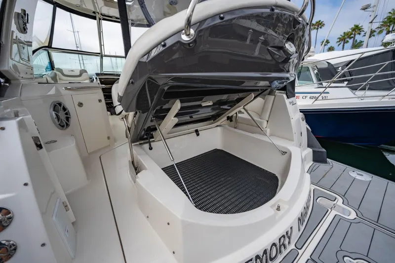 Memory Maker Yacht Photos Pics 2013 Monterey 340 Sport Yacht open storage compartment at marina.