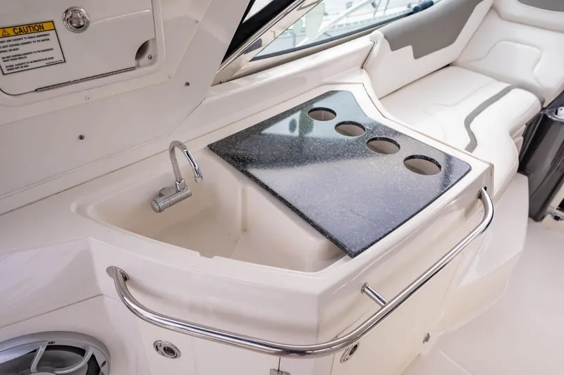 Memory Maker Yacht Photos Pics Luxurious 2013 Monterey 340 Sport Yacht interior with sink and countertop.