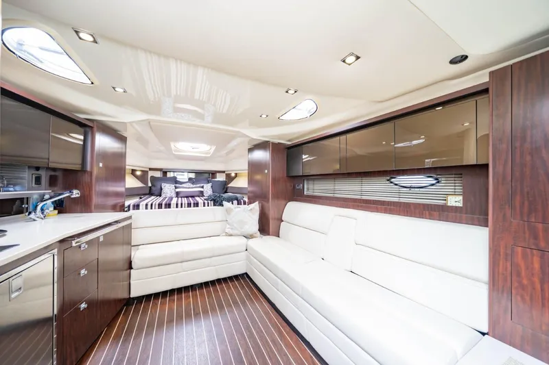 Memory Maker Yacht Photos Pics Luxurious interior of 2013 Monterey 340 Sport Yacht with elegant seating and modern design.