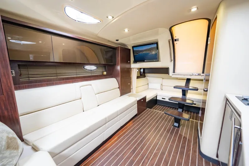 Memory Maker Yacht Photos Pics Luxurious interior of 2013 Monterey 340 Sport Yacht with elegant seating and modern amenities.