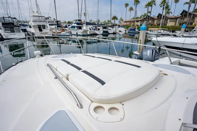 Memory Maker Yacht Photos Pics 2013 Monterey 340 Sport Yacht at marina, featuring spacious deck and luxurious seating.