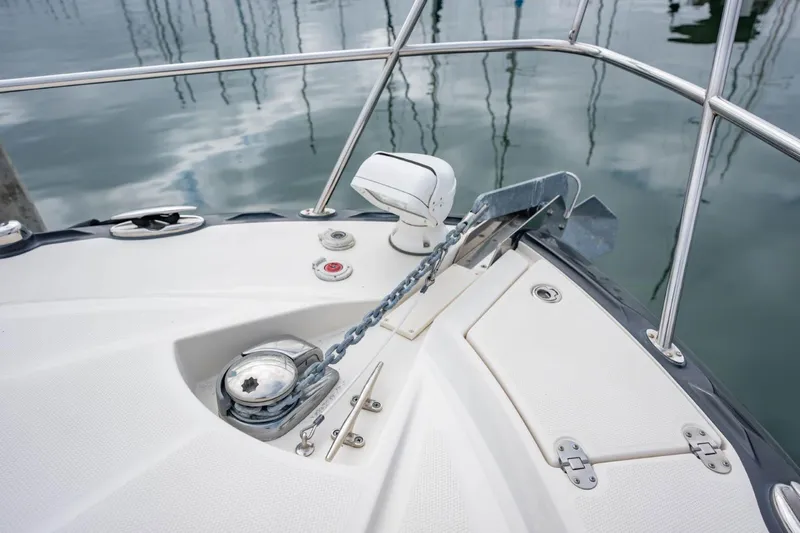 Memory Maker Yacht Photos Pics Bow of 2013 Monterey 340 Sport Yacht with anchor and railing.