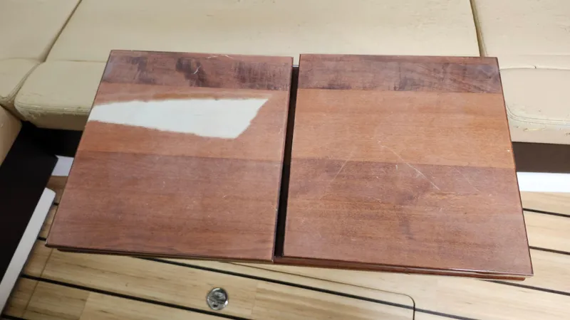  Yacht Photos Pics Wooden table surface on a 2014 Regal 35 Sport Coupe boat interior.