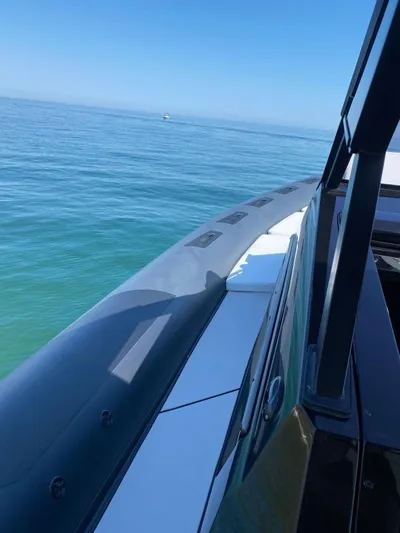  Yacht Photos Pics 2023 Cayman Yachts 45.0 Cruiser on calm blue sea.