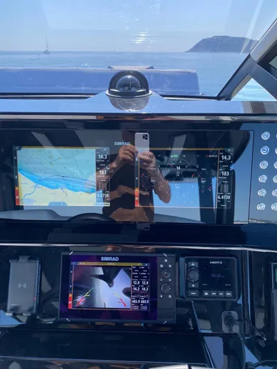  Yacht Photos Pics 2023 Cayman Yachts 45.0 Cruiser dashboard with navigation screens and controls.