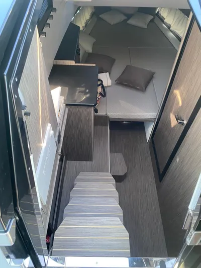  Yacht Photos Pics Interior of 2023 Cayman Yachts 45.0 Cruiser, featuring modern design and comfortable seating.