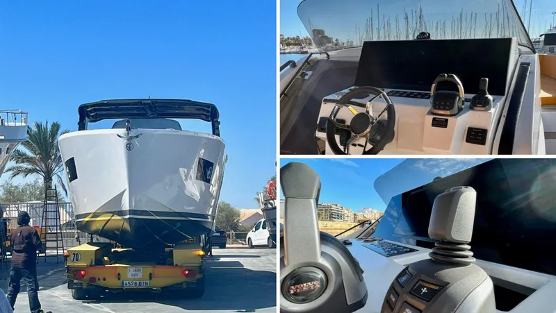 Quantum Yacht Photos Pics 2024 Tesoro T40 Inboard boat on trailer, featuring sleek design and modern cockpit controls.