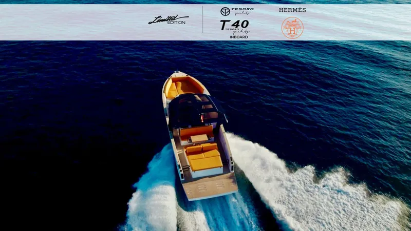 Quantum Yacht Photos Pics 2024 Tesoro T40 Inboard luxury yacht cruising on open water.