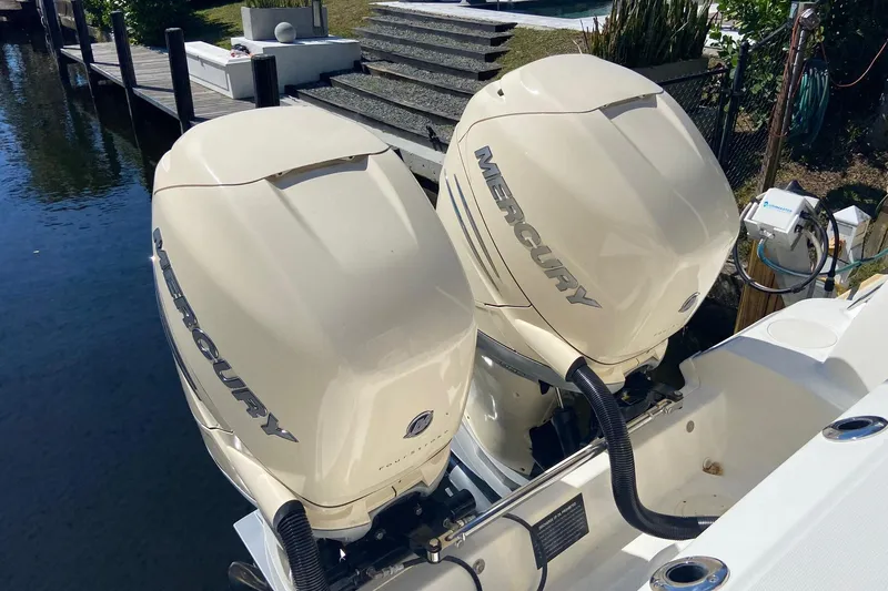  Yacht Photos Pics Twin Mercury outboard engines on a 2011 Boston Whaler 320 Outrage boat.