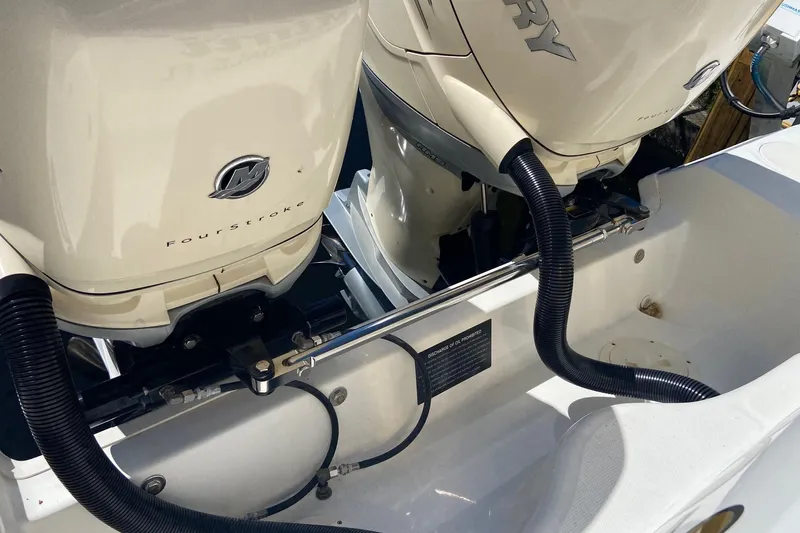 Yacht Photos Pics 2011 Boston Whaler 320 Outrage with dual Mercury FourStroke outboard engines.