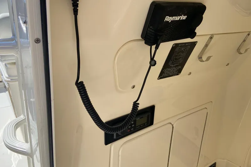  Yacht Photos Pics 2011 Boston Whaler 320 Outrage interior with Raymarine equipment and hooks.