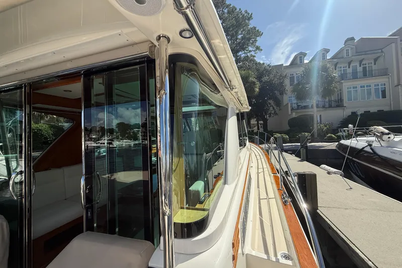 Strange Magic Yacht Photos Pics 2023 Sabre 43 Salon Express yacht docked, showcasing sleek design and luxurious interior.