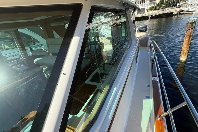 Strange Magic Yacht Photos Pics 2023 Sabre 43 Salon Express yacht docked, showcasing sleek design and luxurious interior.