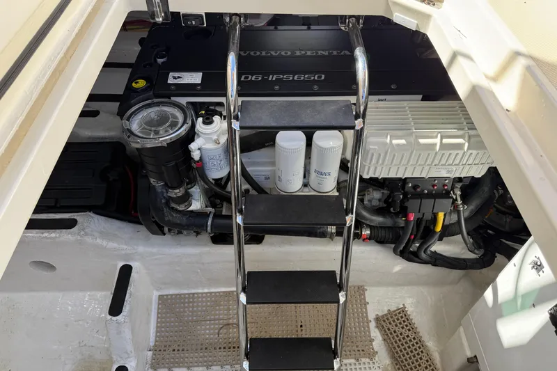 Strange Magic Yacht Photos Pics Engine compartment of 2023 Sabre 43 Salon Express with Volvo Penta D6-IPS650 engine.