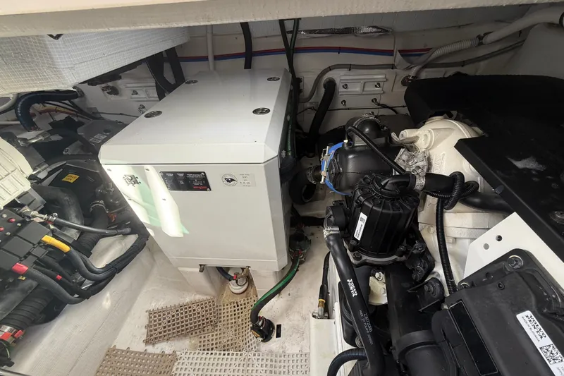 Strange Magic Yacht Photos Pics Engine room of 2023 Sabre 43 Salon Express, showcasing mechanical components and systems.