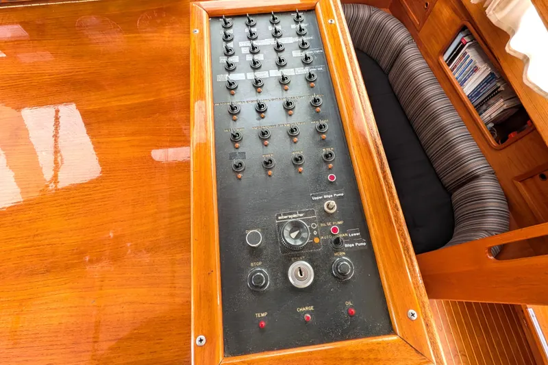 Firefly Yacht Photos Pics Control panel on 1985 Siltala Nauticat 44 yacht, featuring switches and dials.