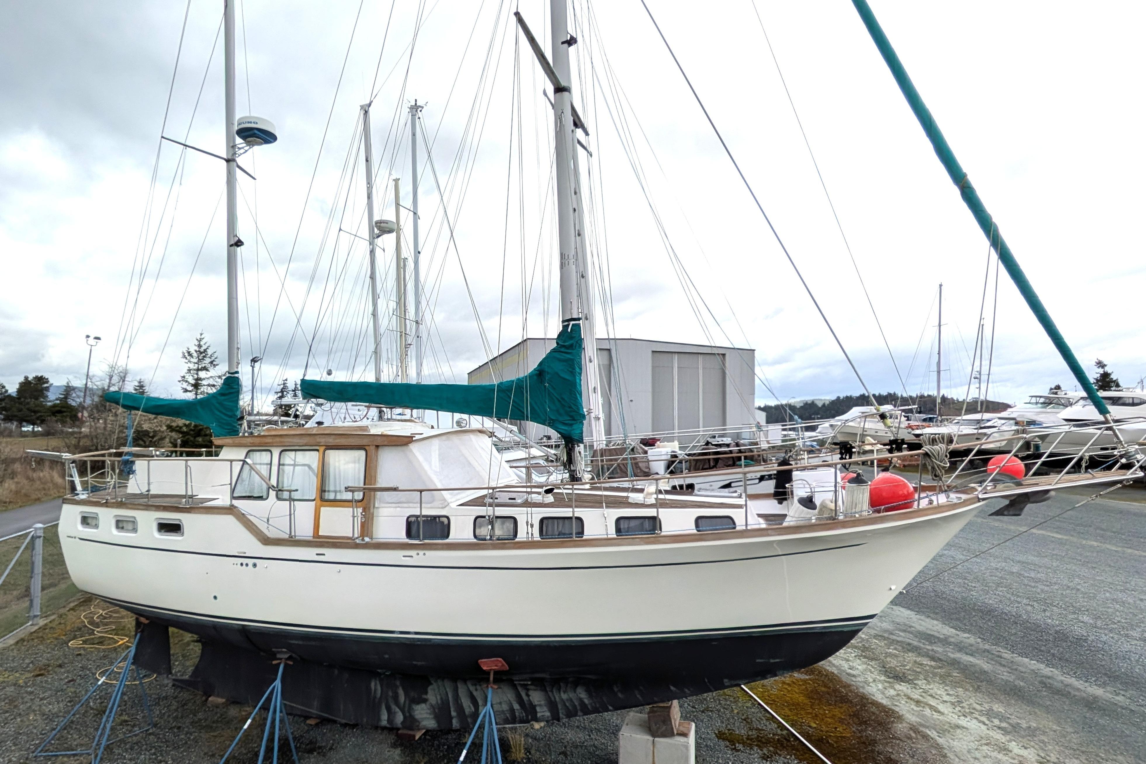 1985 Siltala Nauticat 44 sailboat on dry dock, showcasing its classic design and structure.