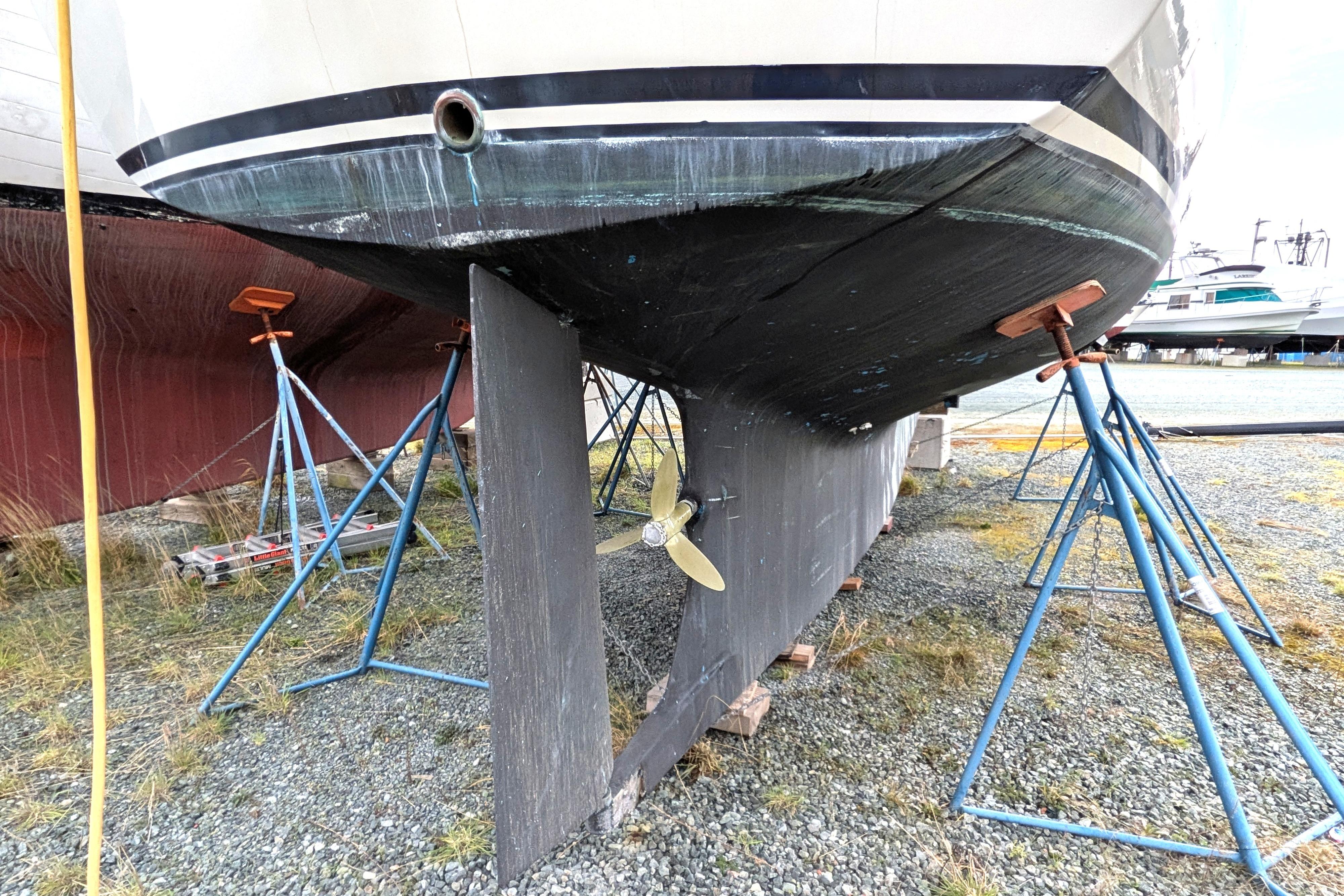 1985 Siltala Nauticat 44 sailboat on stands, showing hull and propeller.